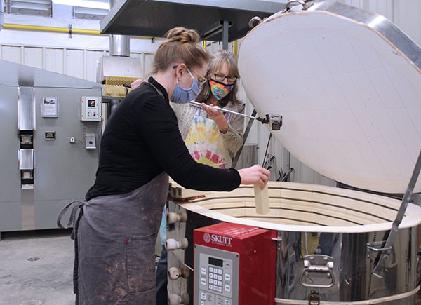 7 For demonstrations of mobile processes, such as kiln loading, the studio technician records her.