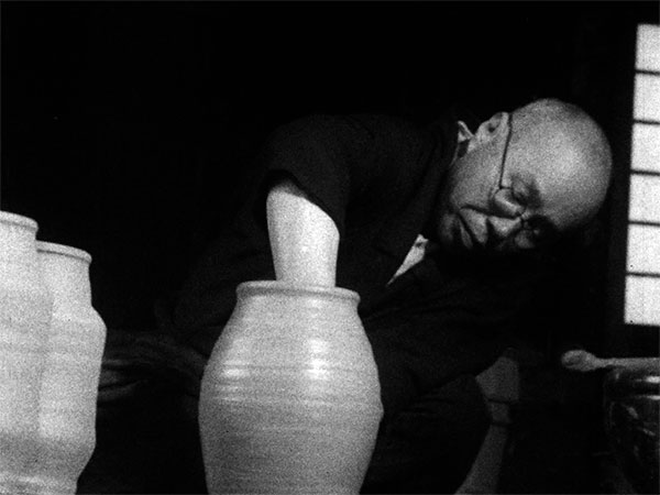 6 Throwing a jar on a hand-turned wheel. From Hamada Shoji in Mashiko, 1950.