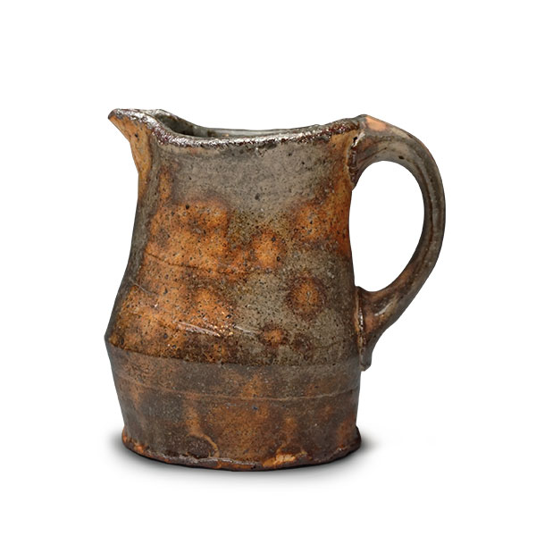1 Creamer, 6 in. (15 cm) in height, wheel-thrown, iron-rich stoneware, kaolin slip, gas reduction fired to cone 7, 2020.