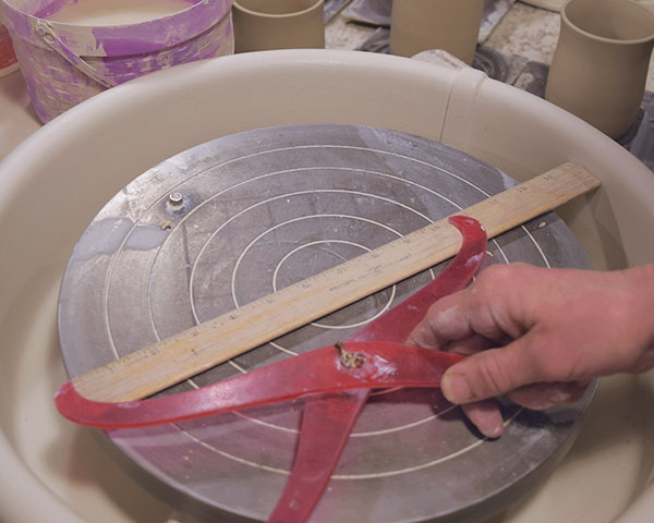 2 For a 9-inch bowl, use a ruler to set the calipers to 10 and 3⁄16 inches.