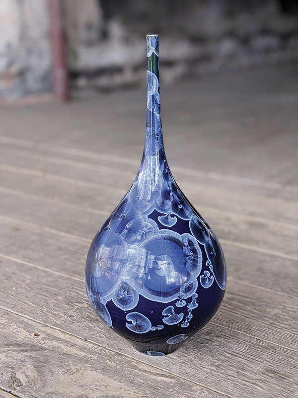 10 Drew Darley’s blue crystalline bottle, 15 in. (38 cm) in height, wheel-thrown porcelain, crystalline glaze, fired to cone 11 in oxidation.