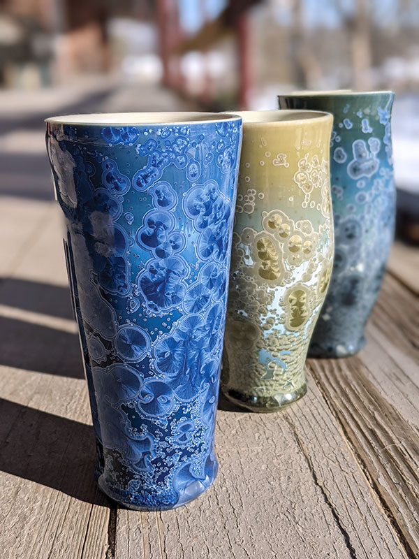 5 Drew Darley’s crystalline tumblers, 7 in. (18 cm) in height, wheel-thrown porcelain, crystalline glaze, fired to cone 10 in oxidation.