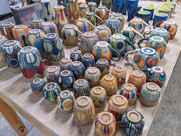 9 A full batch of pots by Erika Novak and Drew Darley fresh out of the kiln, ready to be added to the shop website.