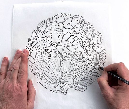 1 Throw or handbuild a plate using a clay body without grog, then sketch a design on regular or tracing paper.