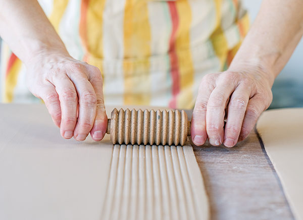 2 Use a textured roller to add texture to the entire rim slab.