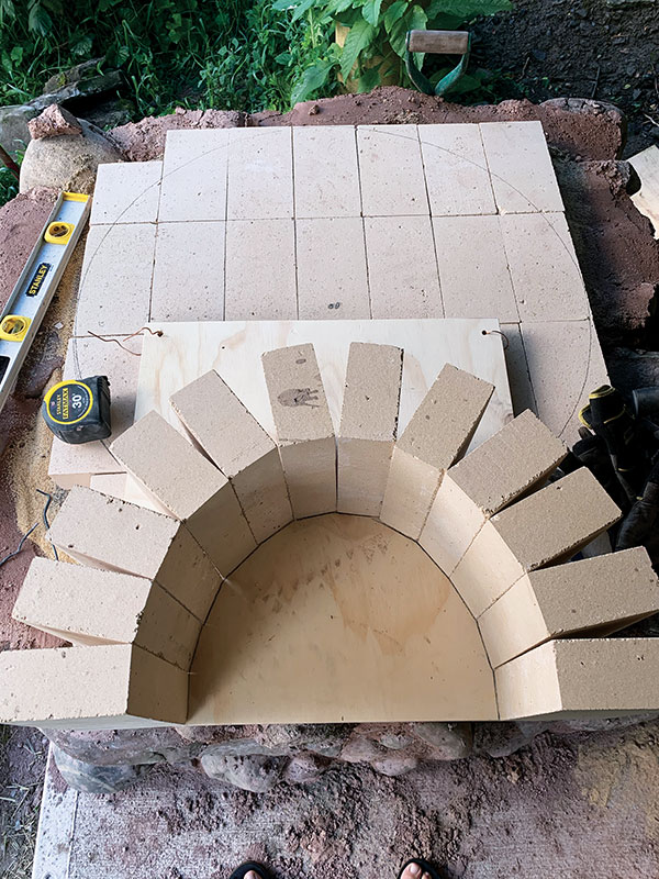 8. Set the door width; lay out the arch bricks and draw the curve onto plywood.