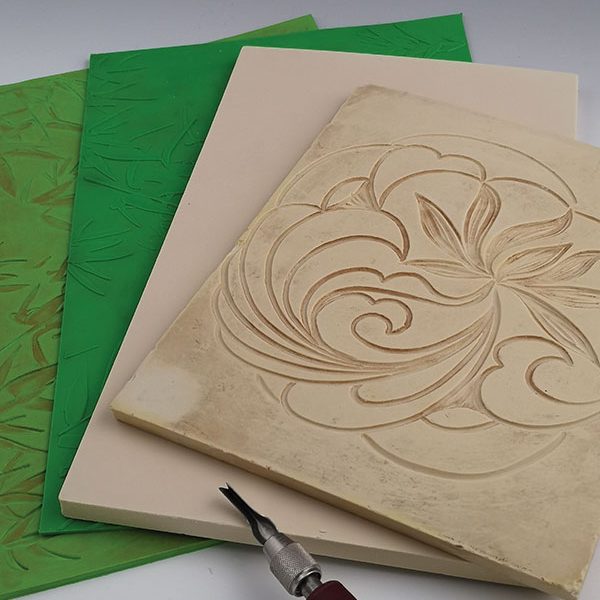 1 Choose a textured pattern—either store bought or hand carved from a lino block.