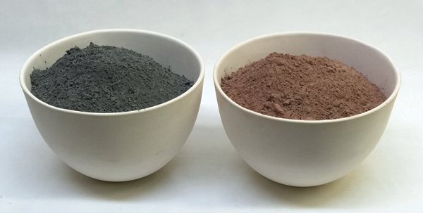2 Two bowls of Alberta Slip powder; the left contains raw, unfired slip powder, the powder in the bowl on the right has been calcined.