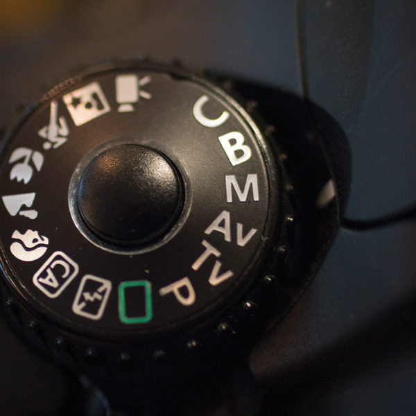 6 Turn the selector to M (manual) to control aperture, shutter speed, and ISO.