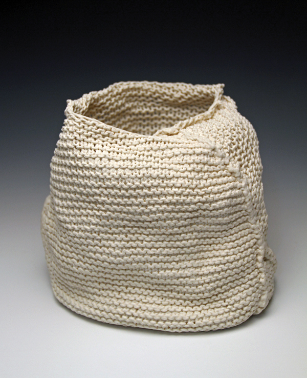 1 Garter Stitch Basket, 8 in. (20 cm) in width, hand knit cotton, dipped in porcelain slip, fired to cone 6 in oxidation, 2017. 