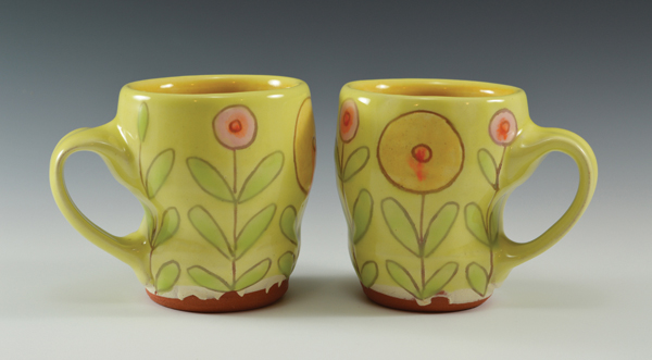 2 Mugs, to 4 in. (10 cm) in height, earthenware, polychrome glazes, fired to cone 04 in an electric kiln, 2014.