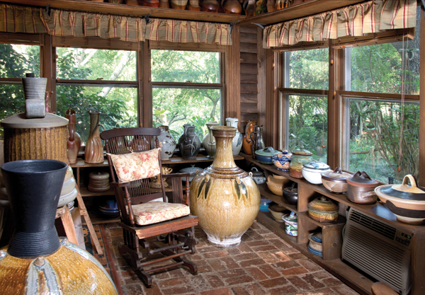 2 A collection of lidded jars and pitchers near the windows, Mark Hewitt’s large vessel in the foreground.  Photo: Greg Stewart Photography. 
