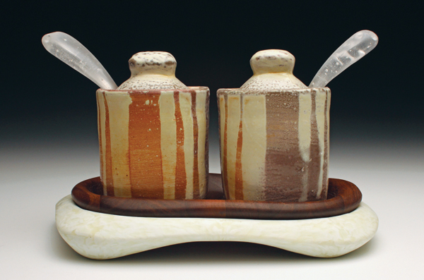 1 Lisa York’s sugar and honey jar set, 10 in. (25 cm) in length, ceramic, wood, glass.