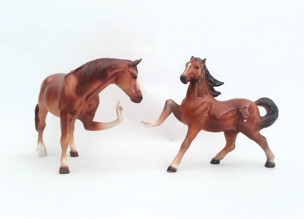 2 Debra Broz’s Dressage Horses, modified vintage ceramic figurines, mixed media, 2015.