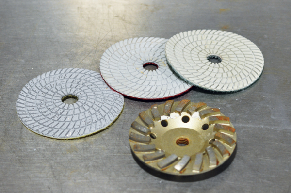 5 The selection of grinder pads and the cup wheel. 