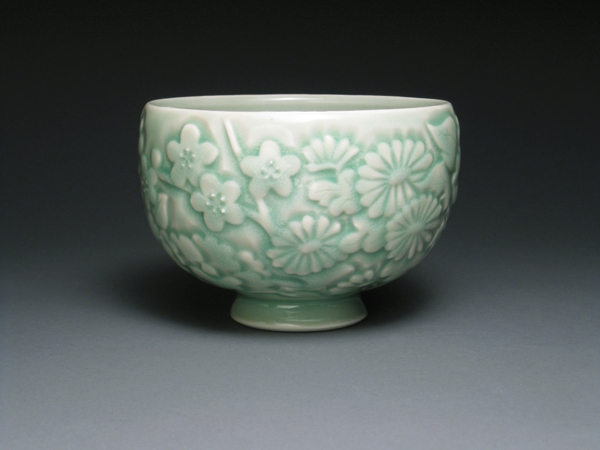 Yoshi Fujii's Teabowl, 5 in. (13 cm) in height, wheel-thrown, hand-carved, and slip-trailed porcelain, celadon glazes, gas reduction fired to cone 10, 2014.