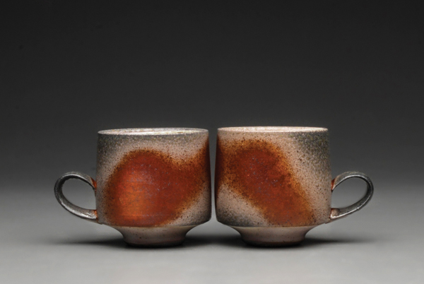 1 cup pair, 3½ in. (9 cm) in width, wheel thrown stoneware, soda fired to cone 8 in reduction, 2017.