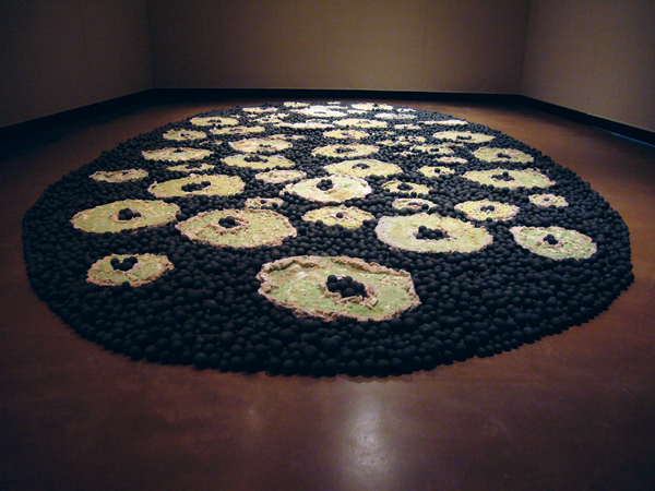 2 Green on Black I, 18 ft. (5 m) in length, handbuilt stoneware marbles, sand-cast glaze, 2007. Photo: Alissa Donaldson.