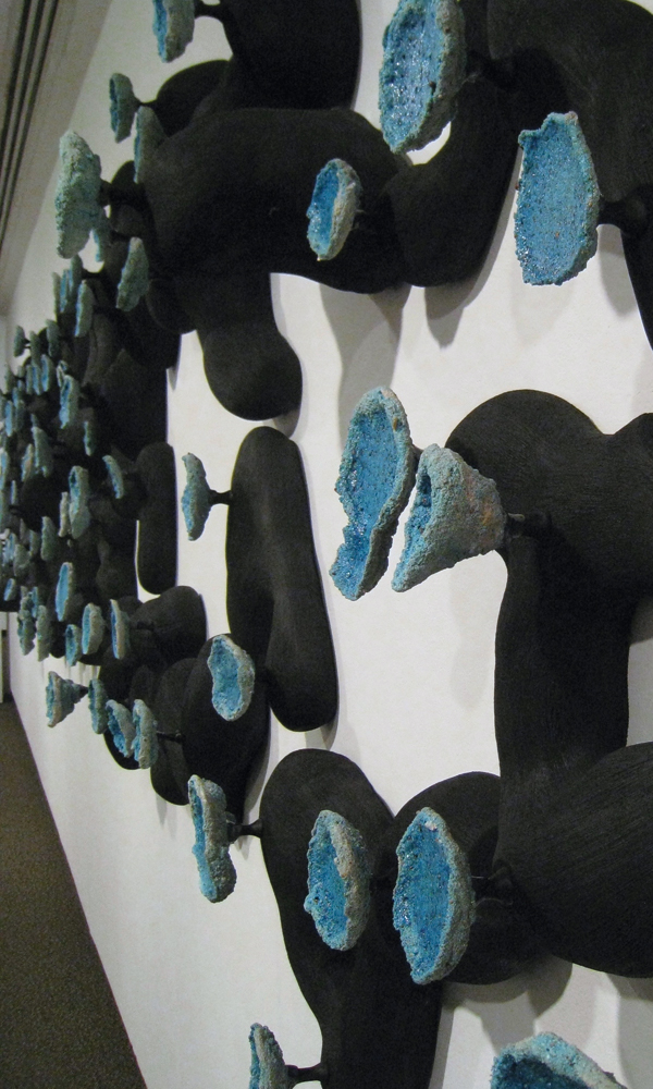 5 Blue on Black II (detail), 40 ft. (12 m) in length, stoneware, sandcast glaze, 2013. Photo: Alissa Donaldson.