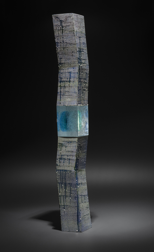 1 Kondo Takahiro’s Monolith-Bluegreen Mist, 43 3/8 in. (110 cm) in height, glazed porcelain, silver mist overglaze, cast glass, 2014. Photo: Tomas Svab. 