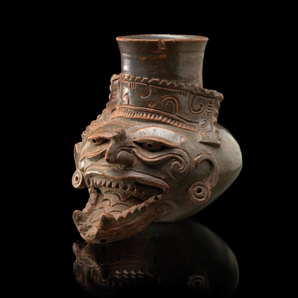 1 Lempa River vessel depicting the god of fire, pottery, clay slip, San Salvador, El Salvador CE 900–1200. Photo: Ernest Amoroso. 