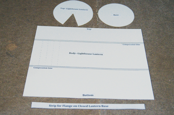 1 Cut and label old file folders to make templates for a lighthouse lantern.