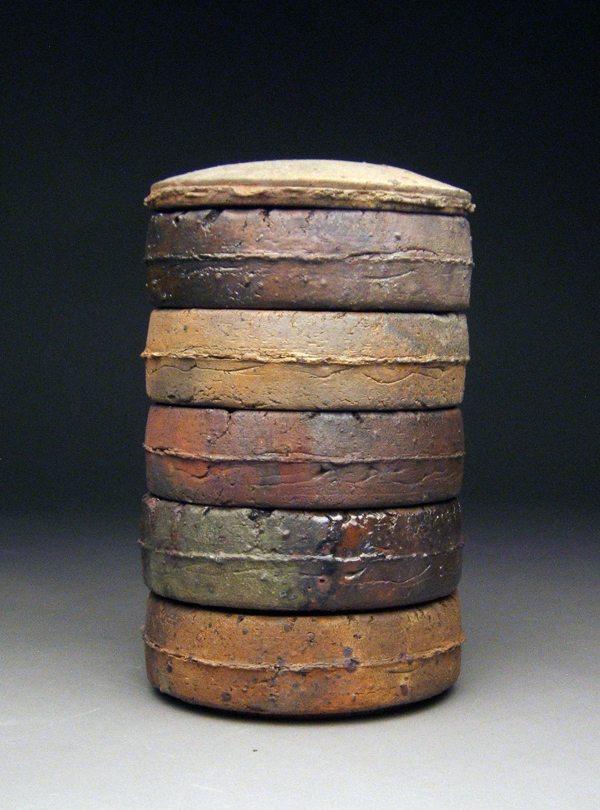 2 Lindsay Oesterritter’s stacking boxes, 10 in. (25 cm) in height, iron-rich stoneware.