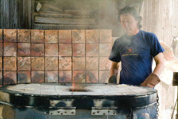 5 Radca firing an old electric kiln, which has been converted into a gas kiln.