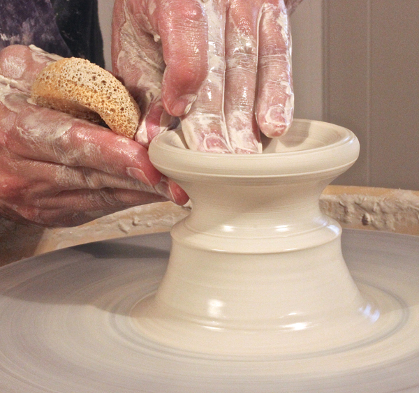 Classic Making a Pottery Bowl on the Pottery Wheel Stock Photo