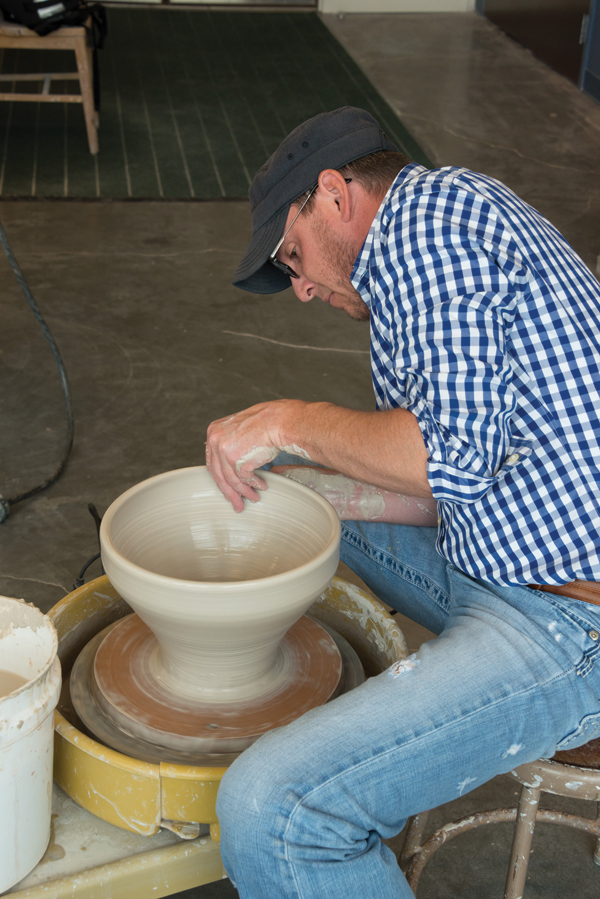 1 Throw a thick cylinder. Widen the rim while keeping the base small.