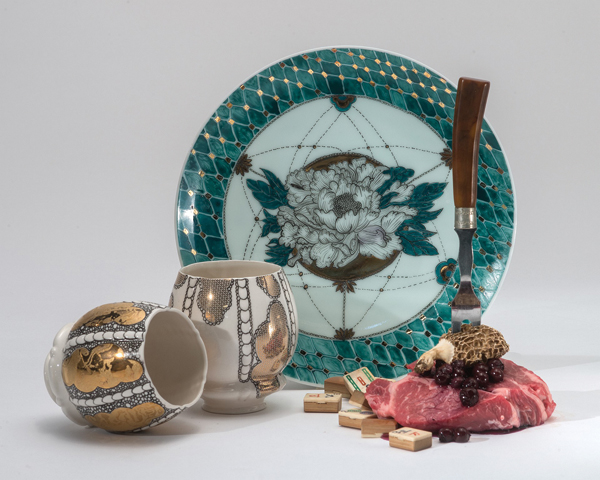 Plate with cups, porcelain, glaze, china paint, luster, with steak, blueberries, mahjong pieces, morel mushroom, and fork, 2015. Photos: EG Schempf.