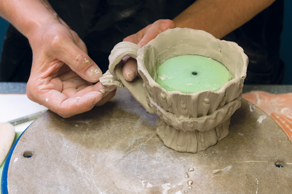 11. Attach the handle to the cup and add sprig embellishments. All process photos: Adam Gruetzmacher.