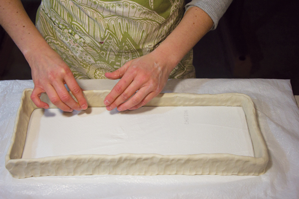 6 Lay a plastic bag over the top of the base platform and begin working on the breadbox lid.