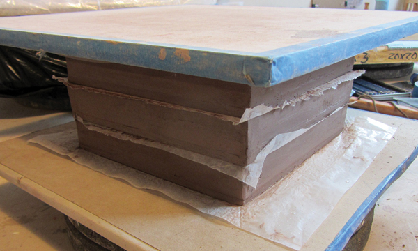 6 Stack trays with wax paper between them, then sandwich the stacked trays between drywall so they don’t warp when drying.