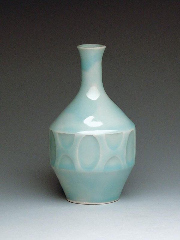 Oval-patterned, water-etched bud vase, 4 in. (10 cm) in height.