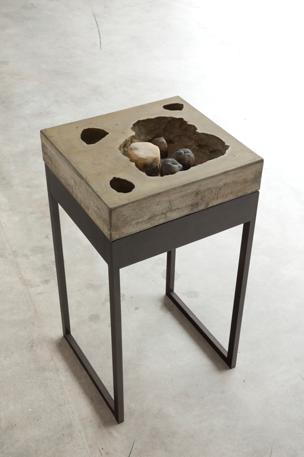 3 Untitled (New Others Series), 18 in. (46 cm) in height, molded, pigmented, cement and raku pieces on metal table, 2013. 