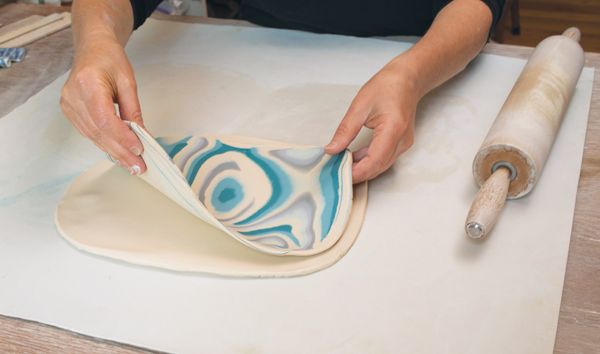 6 To achieve a white interior, laminate the colored clay slice onto a thin slab of porcelain