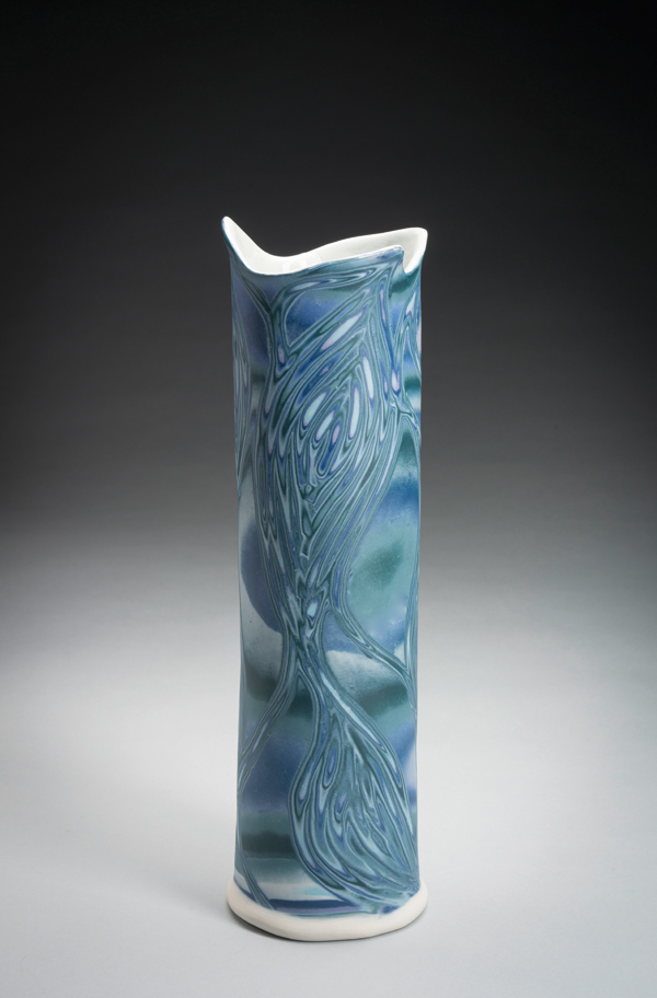 Curves and Waves vase, 11 in. (28 cm) in height, slab-built colored porcelain, fired to cone 10 in gas reduction, 2015.  Photo: Al Karevy.
