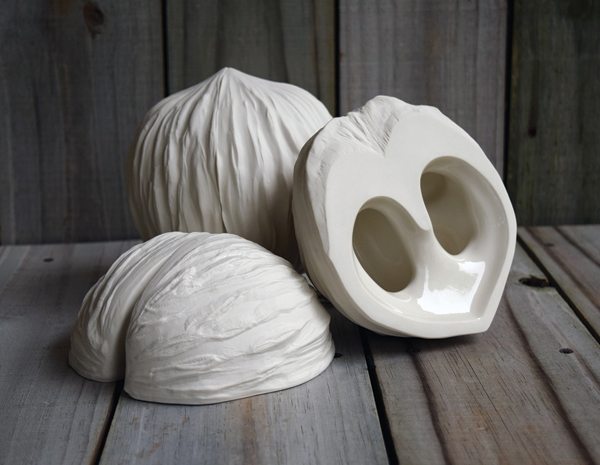 Rachel K. Garceau’s Within the Hollows, slip-cast porcelain. Garceau uses plaster molds to create slip-cast forms for her site-specific installations.