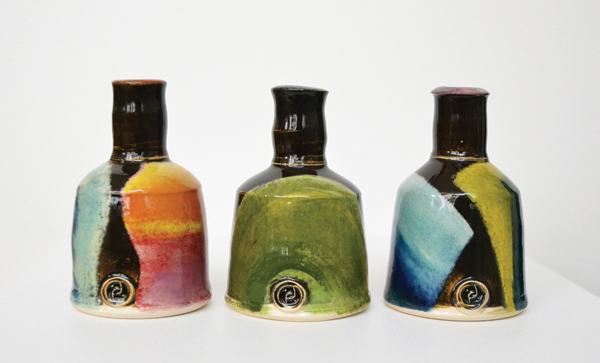 1 John Pollex’s small bottles, 4 in. (10 cm) in height, white earthenware clay, slip, glaze, fired to 2021°F (1105°C).