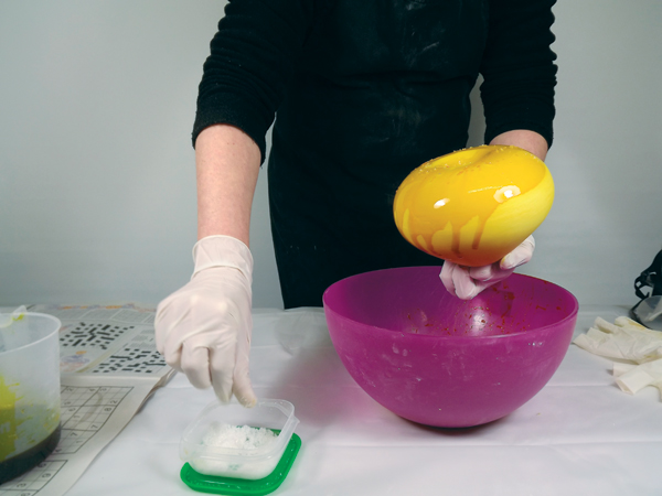 4 Sprinkling sugar onto wet ferric chloride causes a halo effect in the firing process.