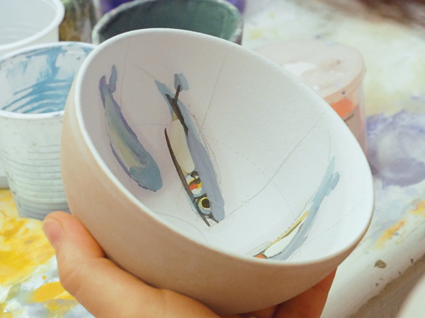 3b Small fish, similar to those found in San Vitale, are drawn on the surface of the dry glaze.