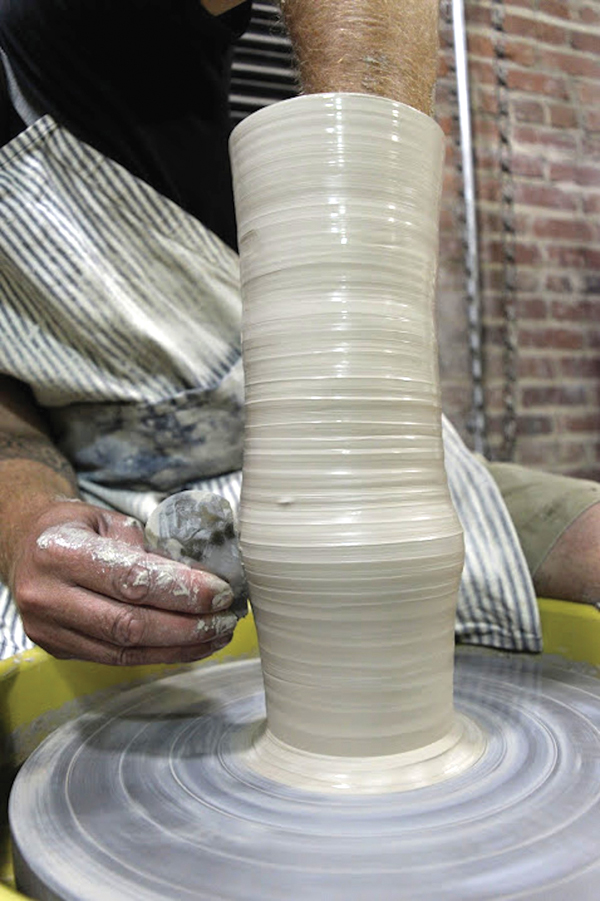 1 Use 4 pounds of clay to throw a cylinder, then shape using your hands and a rib.