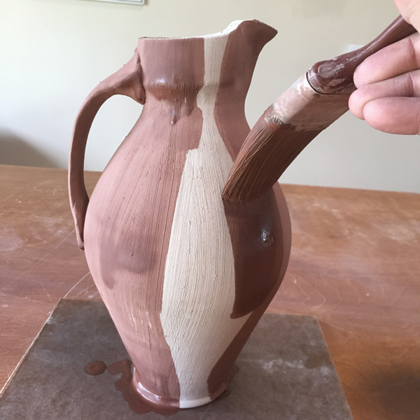 10 Apply a Redart terra sigillata to the bone dry pitcher.