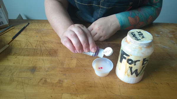 3 Use food coloring to make wax resist easier to see on light-colored surfaces.