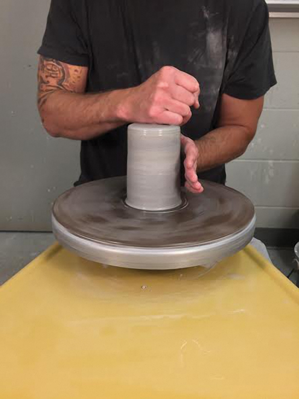 1 Center about 3 pounds of a well-wedged clay of your choice into a tall cylinder form.