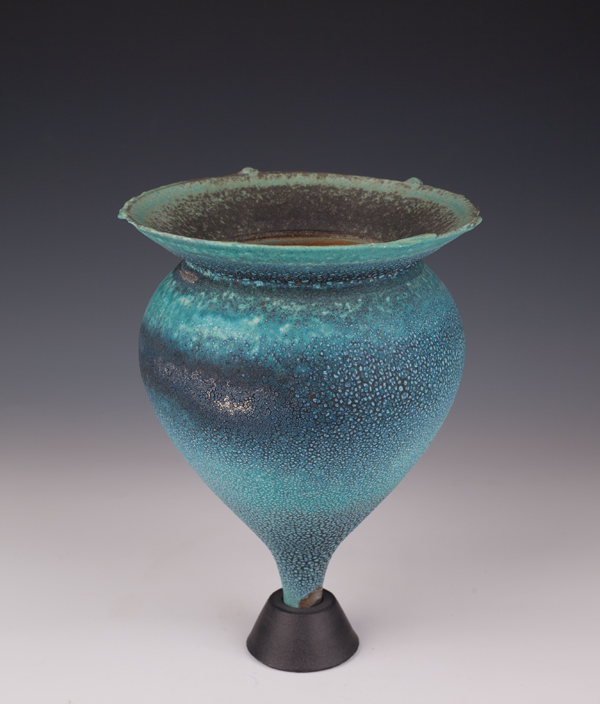 This early crawl glaze experiment was fired with a lithium carbonate glaze and then refired with a crawl glaze.