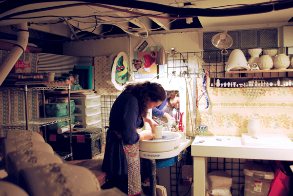 1 Lindsay Scypta starting a pitcher form, using the mirror to check that the base and rim are centered.