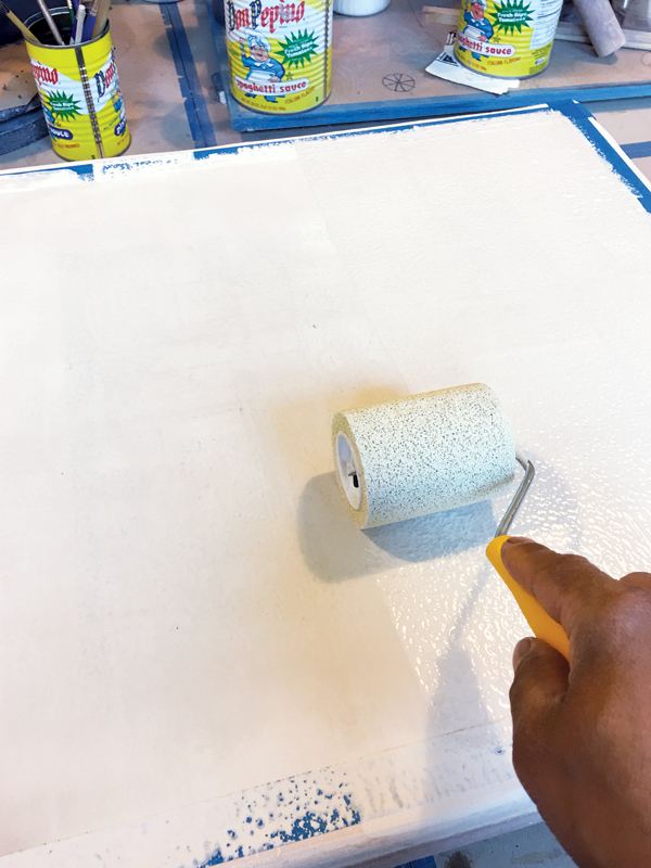 7 Apply an opaque white underglaze over the entire image, creating a white background to retain color and brightness.