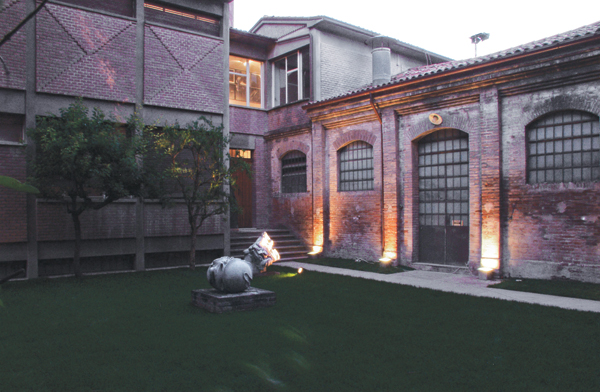 Inside the courtyard of the Carlo Zauli Museum with sculptures made by Zauli on display.